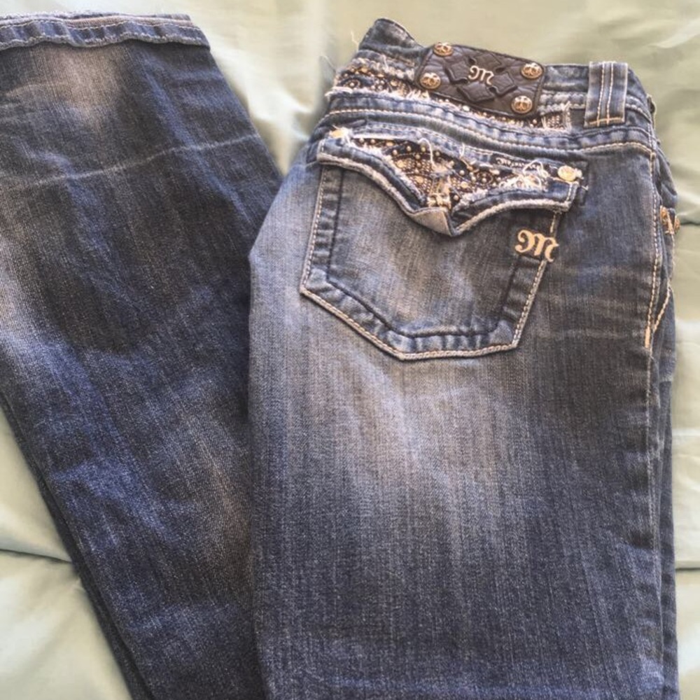 Miss me jeans. THEY ARE MISSING A BUTTON.